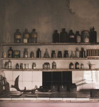 a kitchen filled with lots of bottles and knives